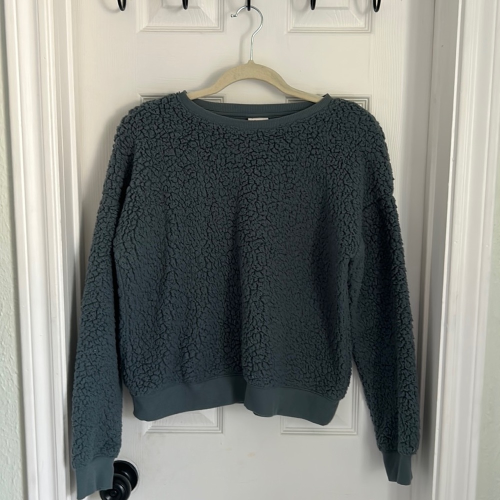 A new day slightly worn furry sweatshirt nice quality no marks or tears